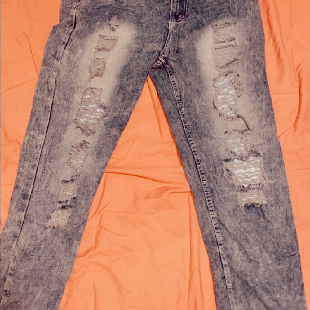 Distressed denim jeans
